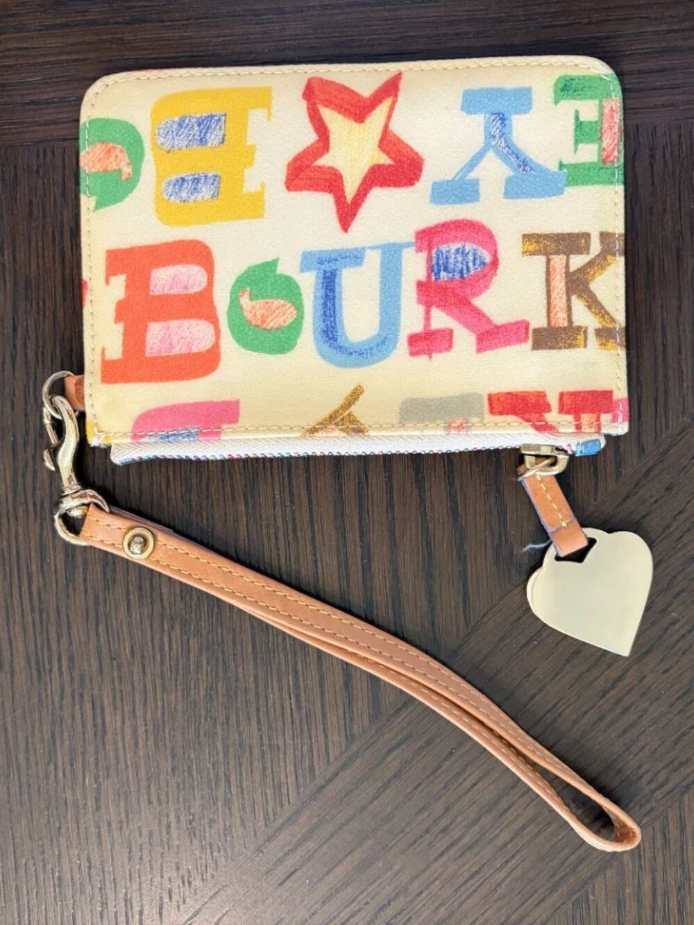 White Dooney & Bourke Wristlet with Multicolored Decor